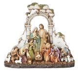 Kneeling Nativity with stone wall 8.5" H